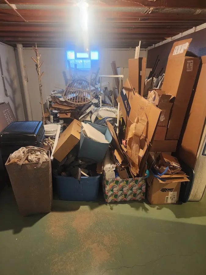 Roll-off dumpster container at job site for 4 Yard Dumpster Rental in Roosevelt Park